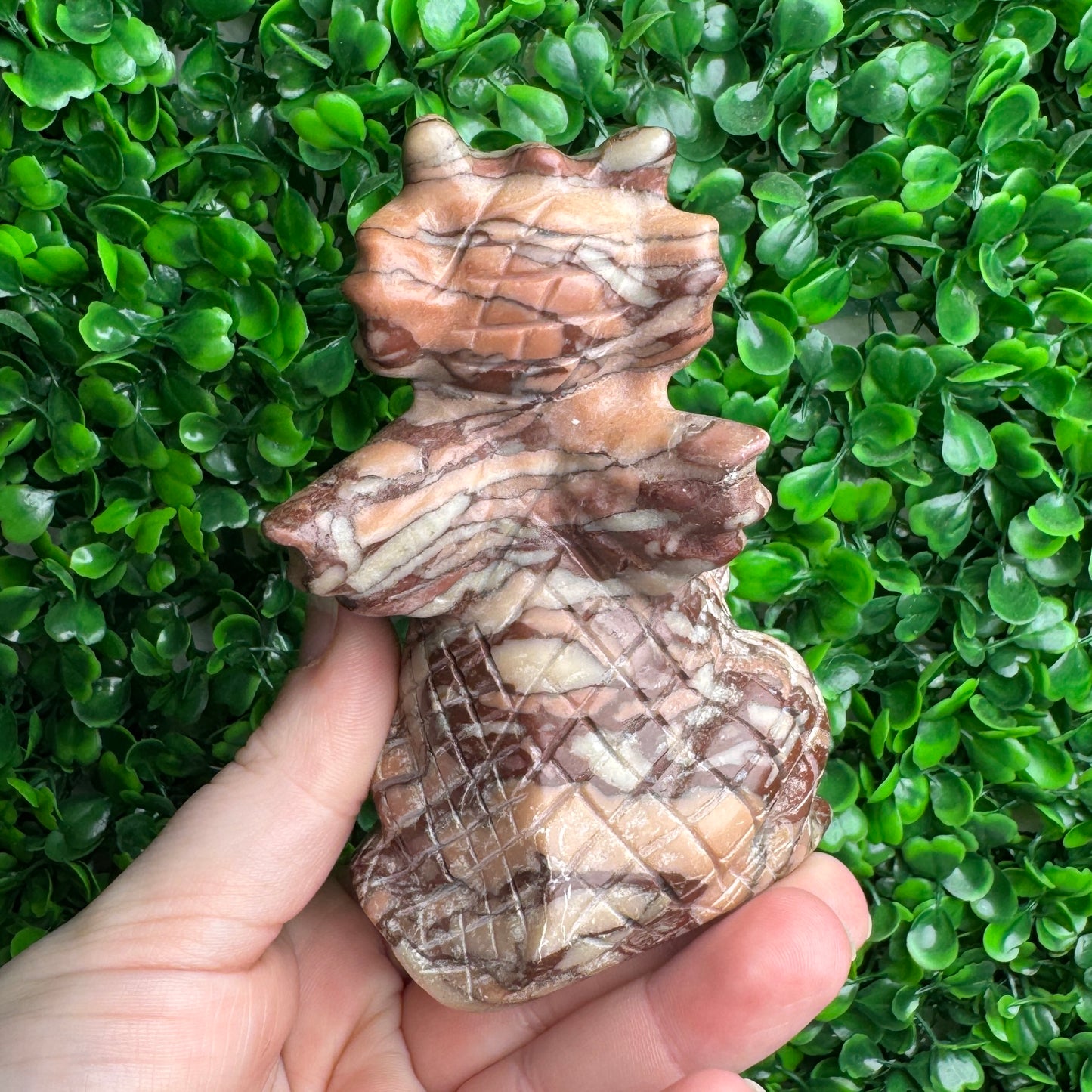 Chocolate calcite dragon carving