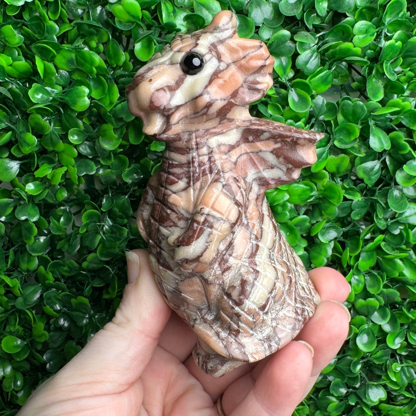 Chocolate calcite dragon carving