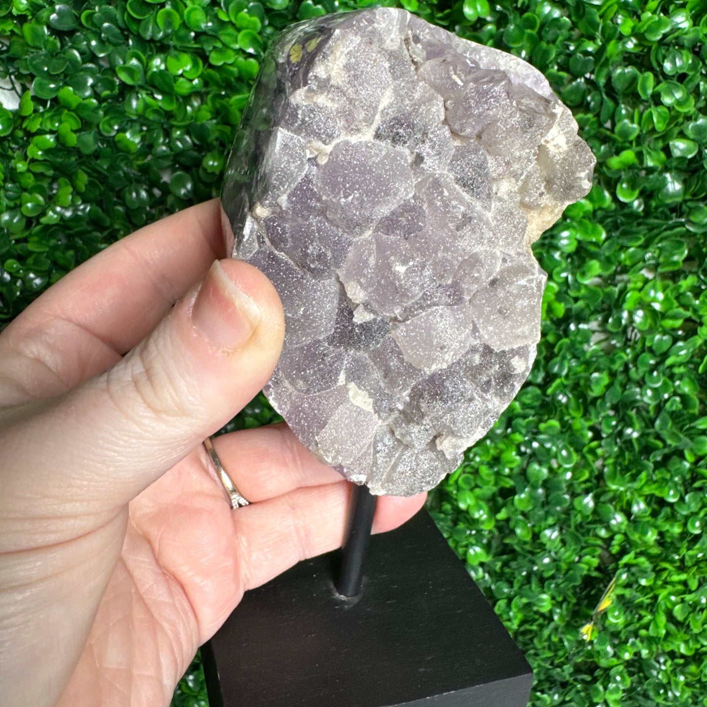 Sugar amethyst piece on a stand