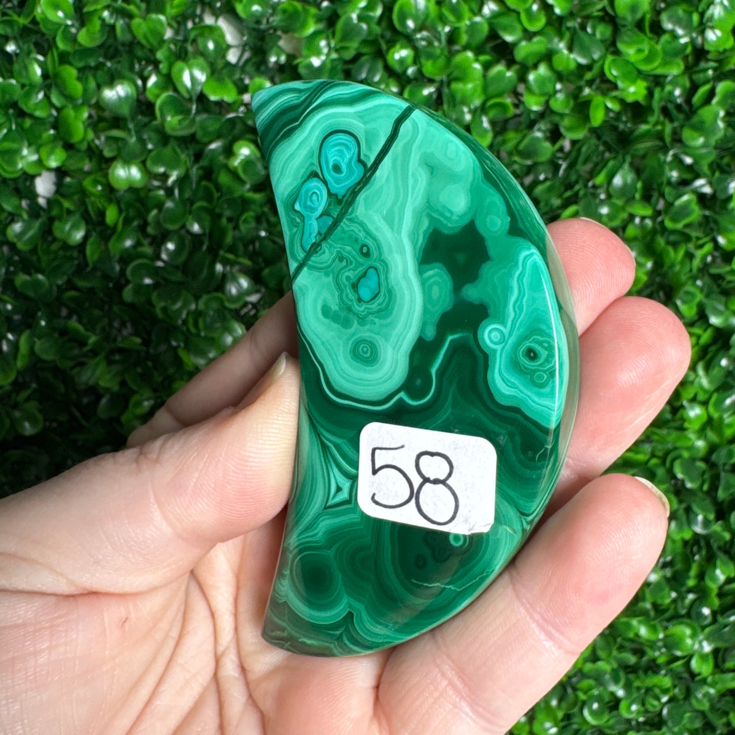 Malachite moon carvings