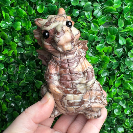Chocolate calcite dragon carving