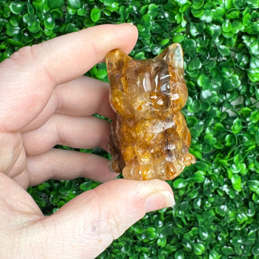 Golden healer cat carving