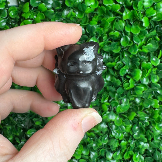 Snowflake obsidian fox carving